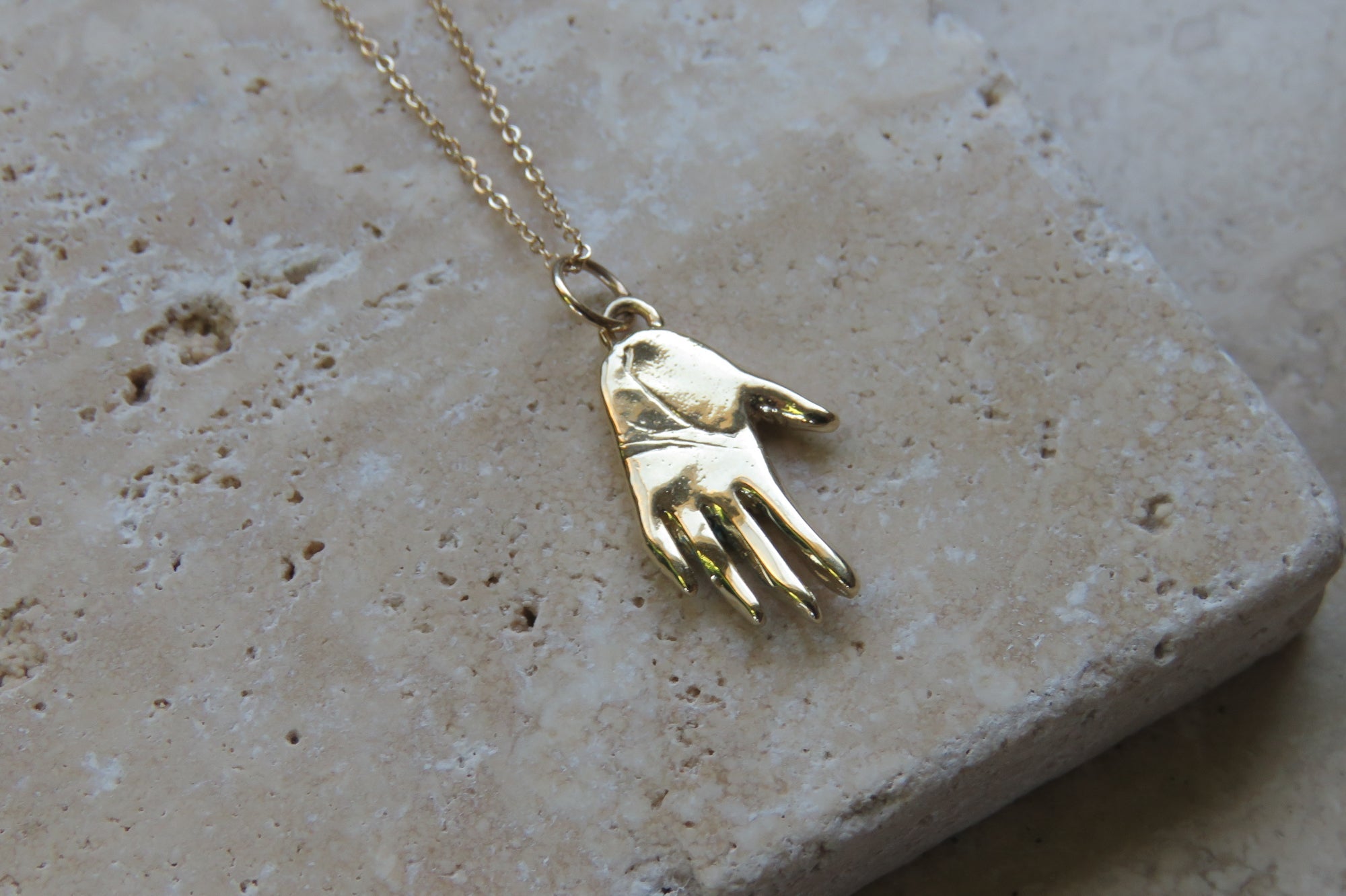 Gold Hand Talisman Necklace