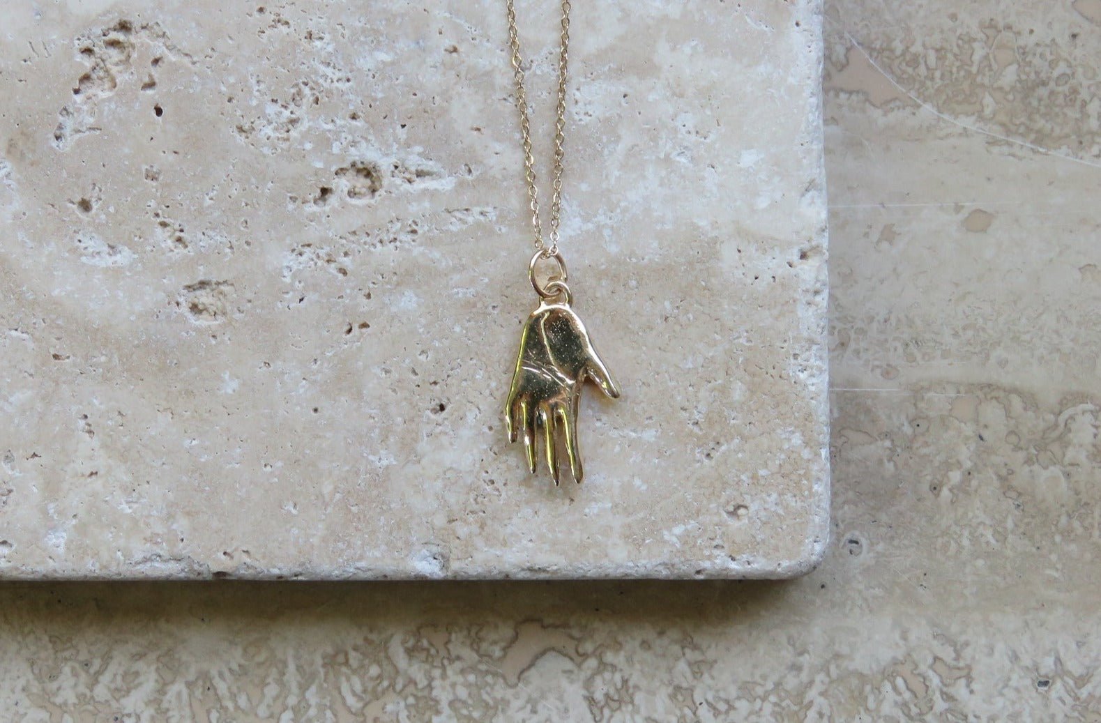 Gold Hand Talisman Necklace